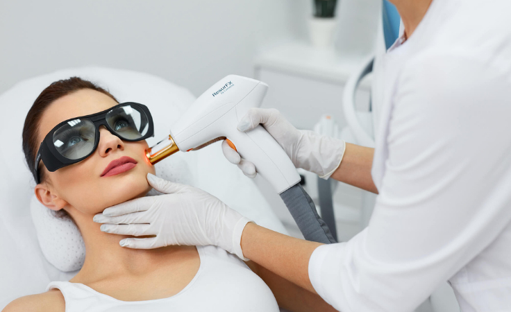 A biohack enthusiast getting laser treatment to fix sagging skin on face