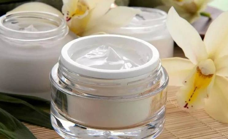 Opened aromatic moisturizer bottle to prevent sagging skin on face