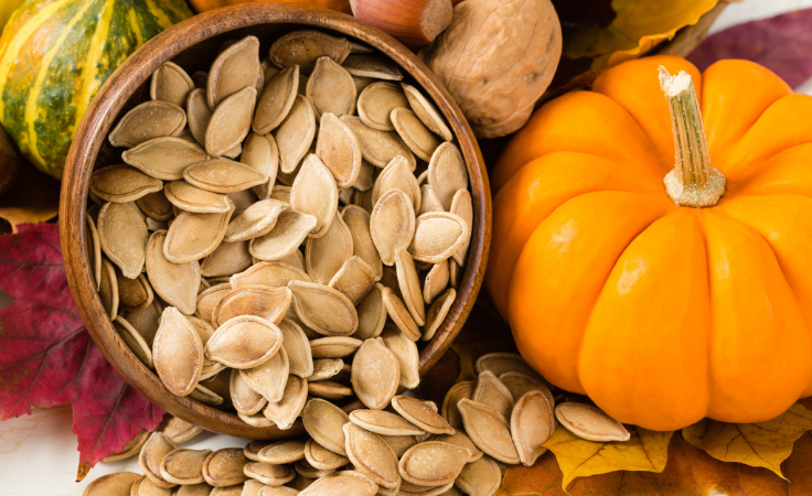 raw pumpkin seed placed with pumpkin for better brain function