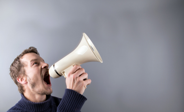 biohacker yells on megaphone to announce he stopped negative thoughts 